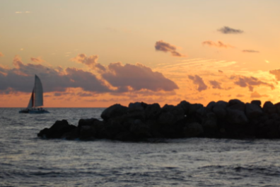 a sunset over a body of water