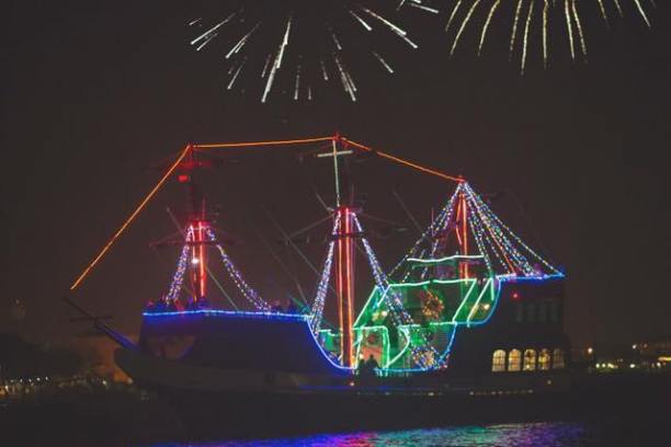 fireworks in the sky over a body of water