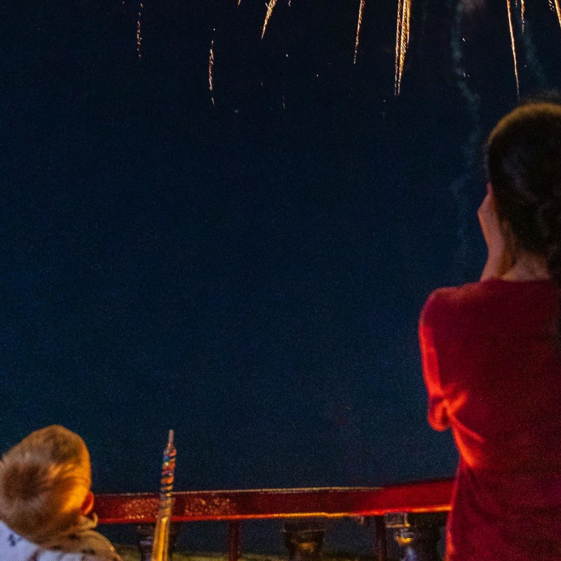 a group of people in a dark room