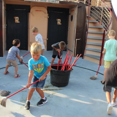 a group of people on a sidewalk