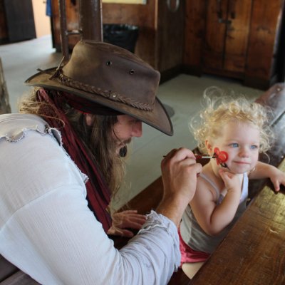 Face painting for pirate themed birthday party