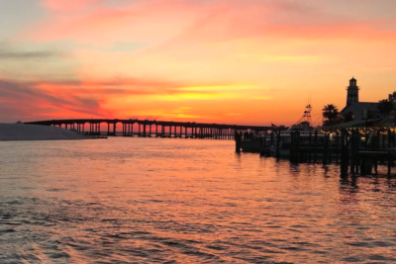 a sunset over a body of water