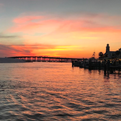 a sunset over a body of water