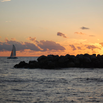 a sunset over a body of water