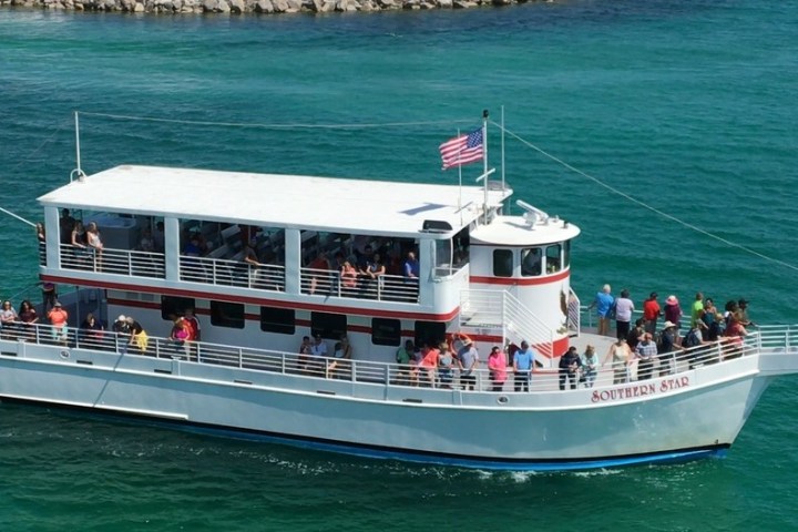 a small boat in a large body of water